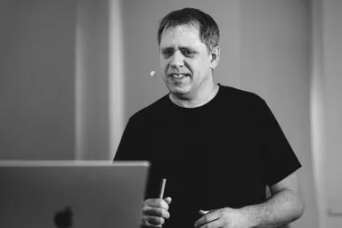 Tobias Modig explaining a point while speaking
