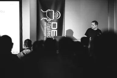Tobias Modig presenting to a full room at a developer conference